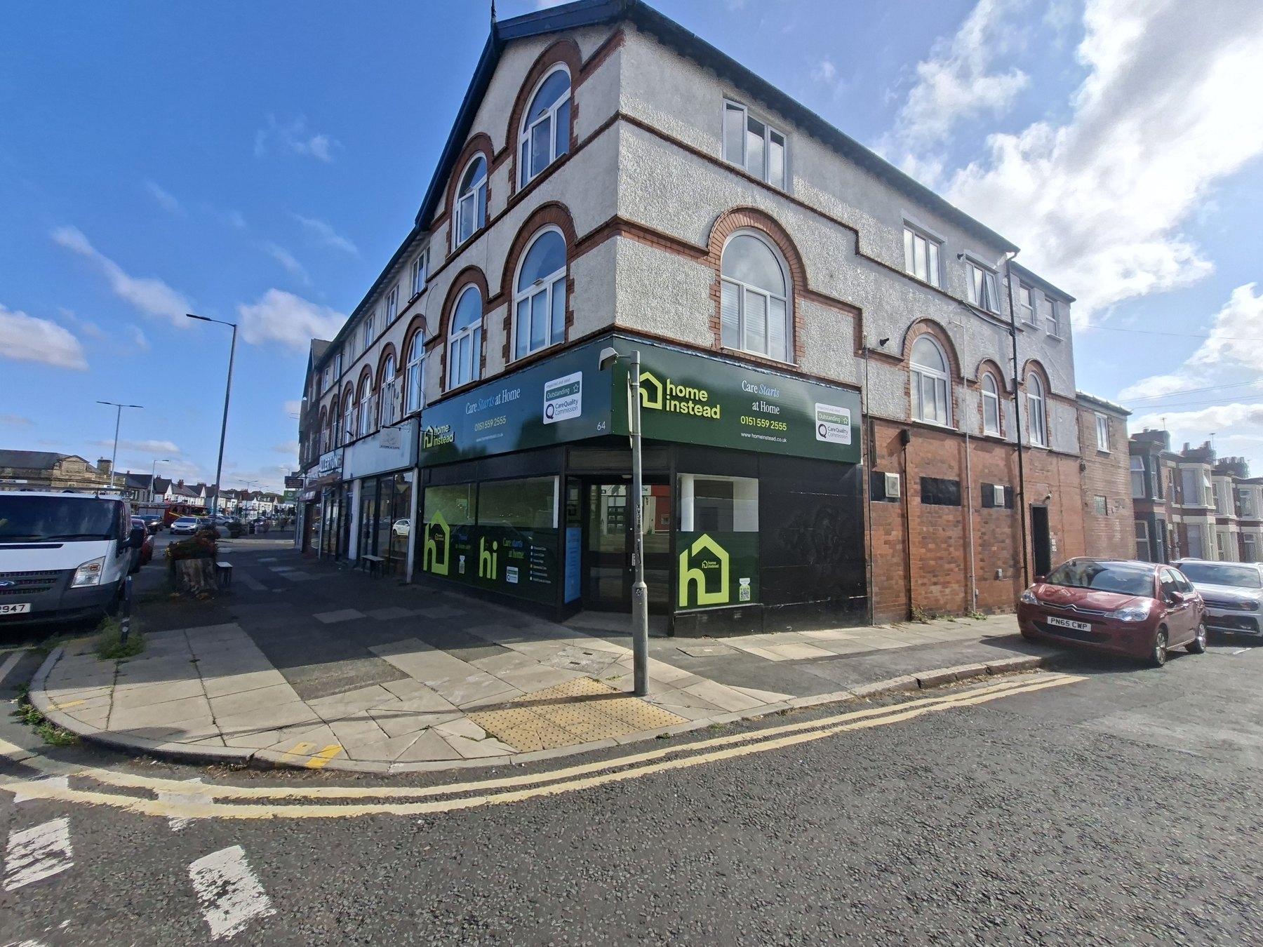 Fascia and window branding on a high street shopfront